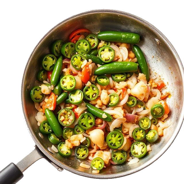 A sauté in a pan featuring Jalapeño peppers, include onions and garlic to give the dish a bold, peppery kick.